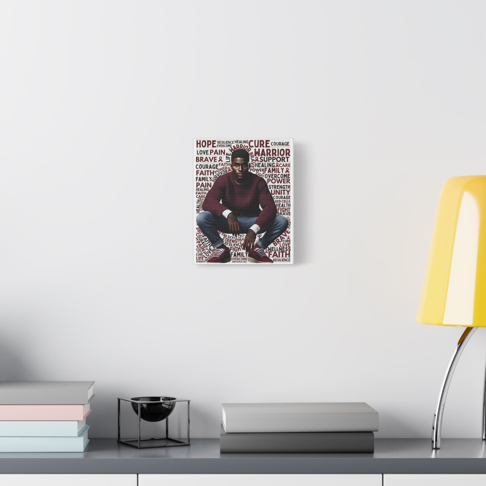 Poster of a person with motivational text on a wall above a desk with books and a lamp.