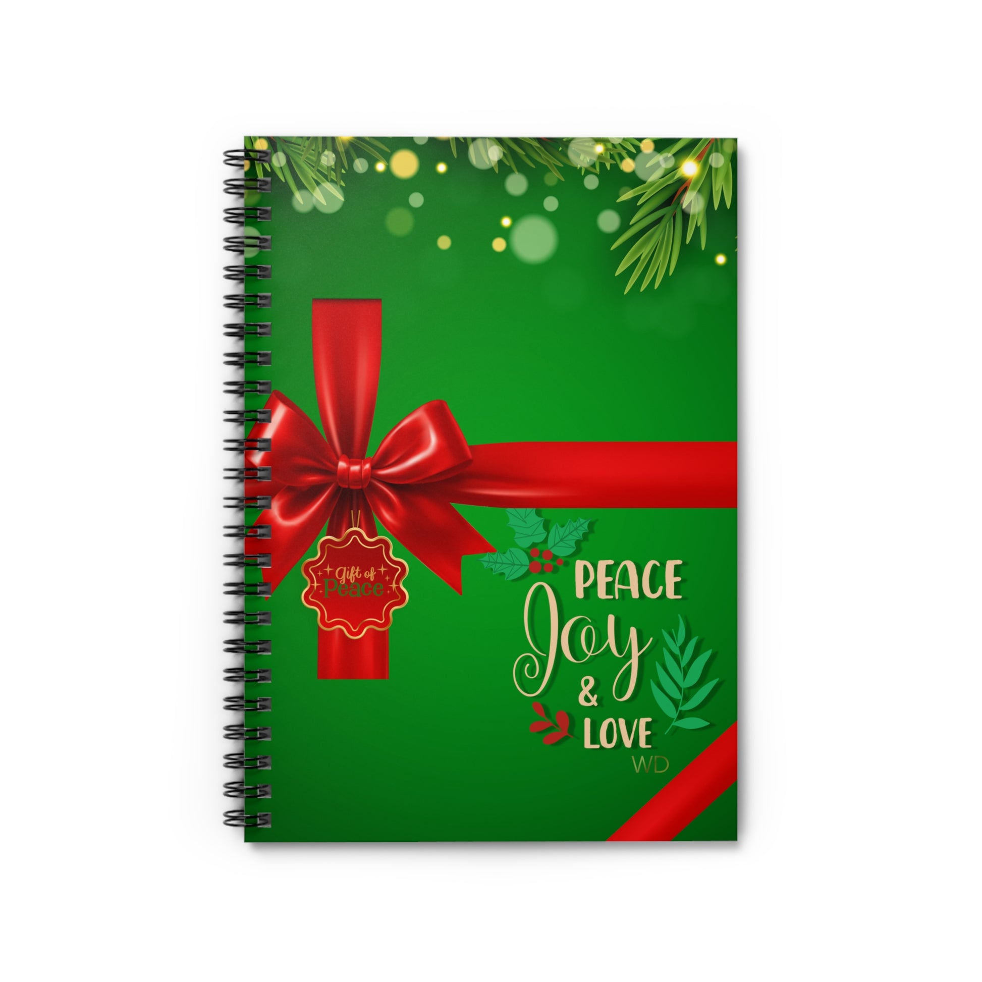Notebook with a Christmas design featuring a red bow and 'Peace Joy & Love' text on a green background.