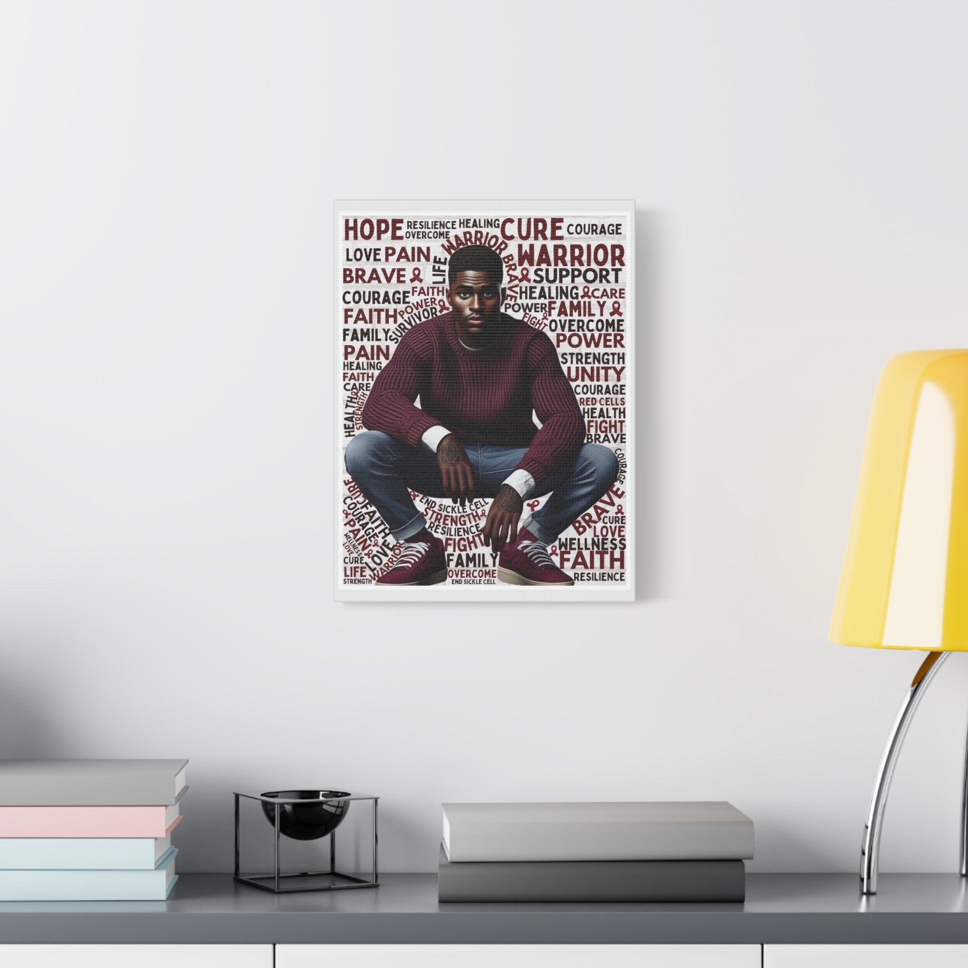 Framed artwork of a man sitting on a couch with motivational words on a white wall.