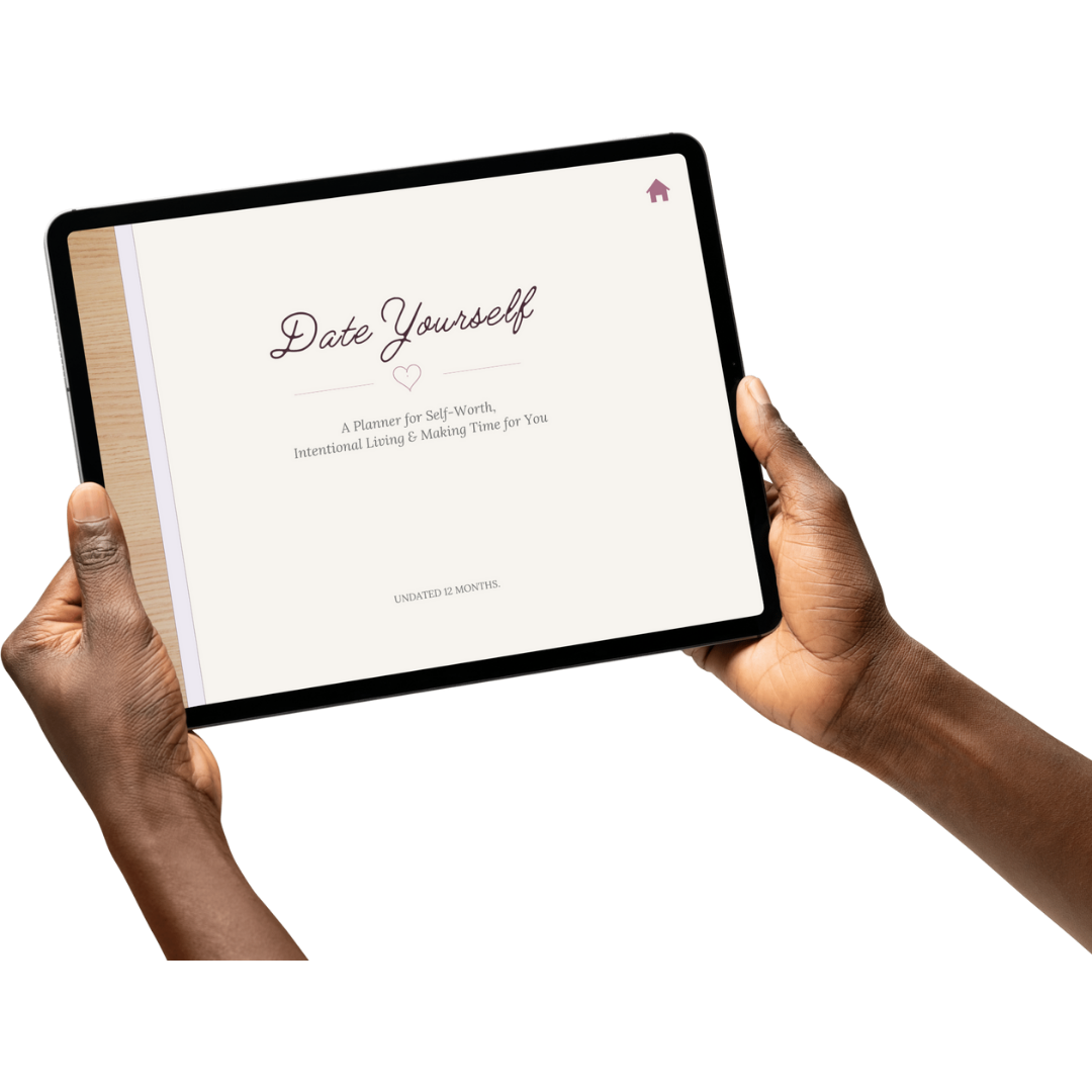 Person holding a tablet displaying a digital product titled 'Date Yourself'.
