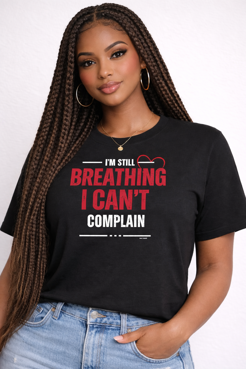 Woman wearing a black t-shirt with motivational text on a white background